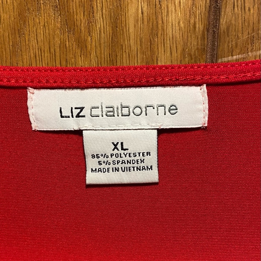 Liz Claiborne holiday blouse.Very soft and free flowing. Compliments figure!!!